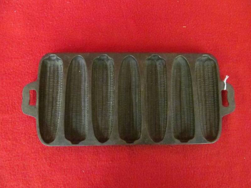 lot 187 image: Cast Iron corn stick mold 70D