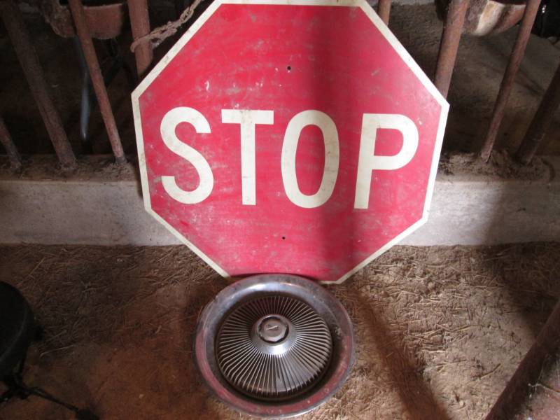 lot 15 image: Stop Sign and Pontiac Hubcap...