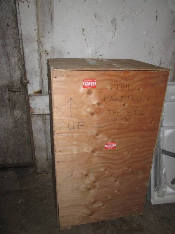 lot 56 image: wood shipping container...