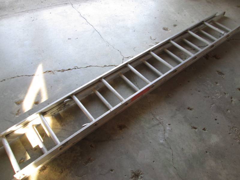 lot 69 image: Aluminum extension ladder...