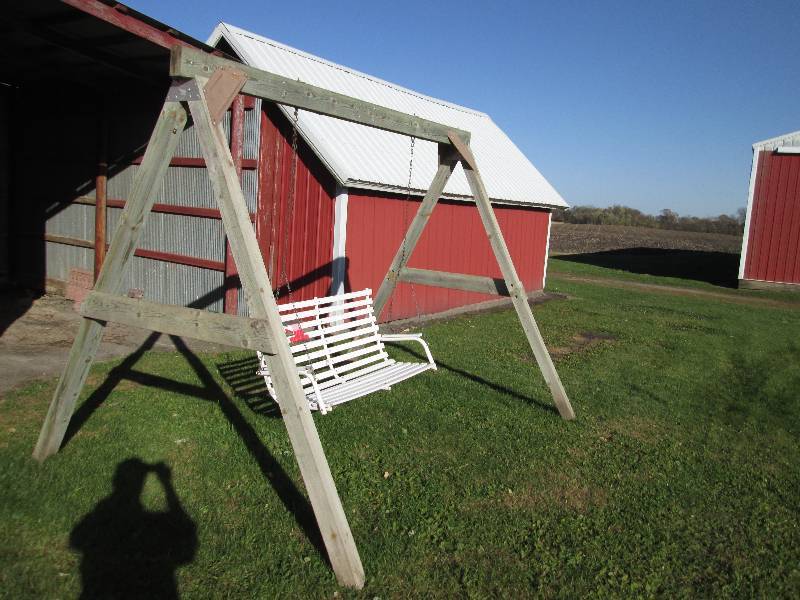 lot 97 image: Large treated lumber frame with yar...