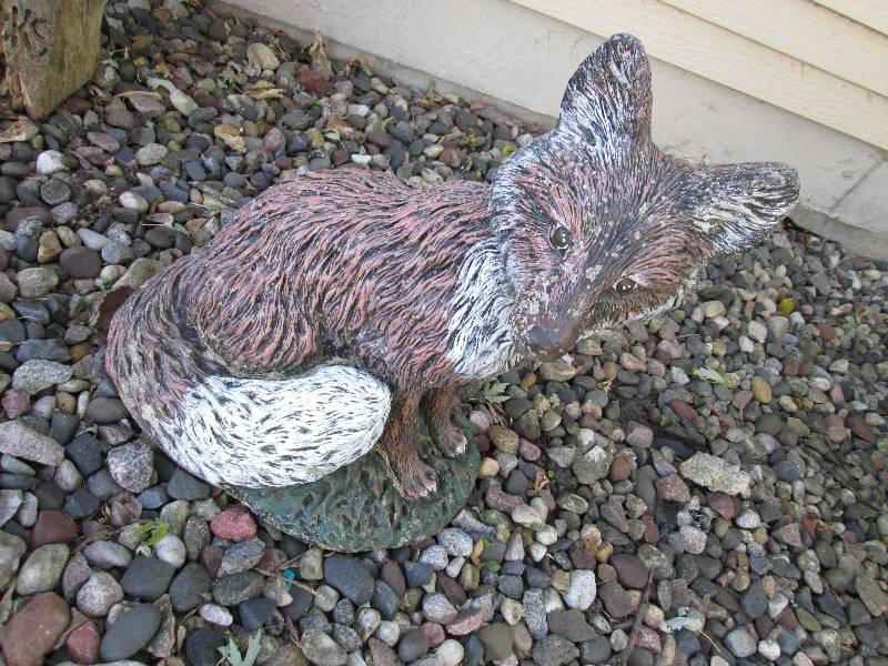 lot 104 image: Cement fox ornament...