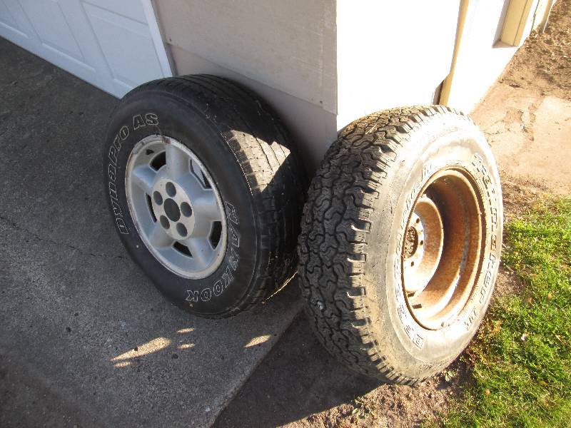 lot 106 image: 2 tires on rims, see pictures for d...