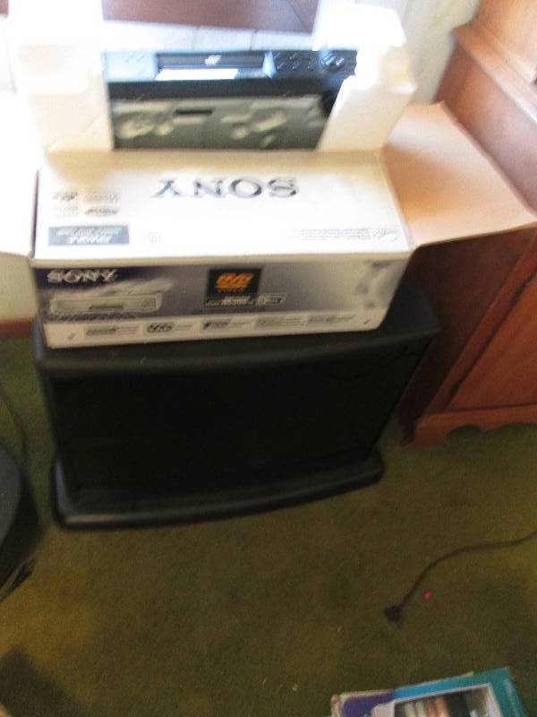 lot 123 image: Sony DVD player and stand...