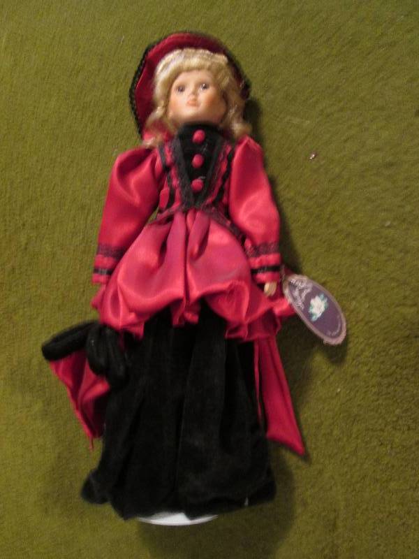 lot 128 image: Vintage doll...