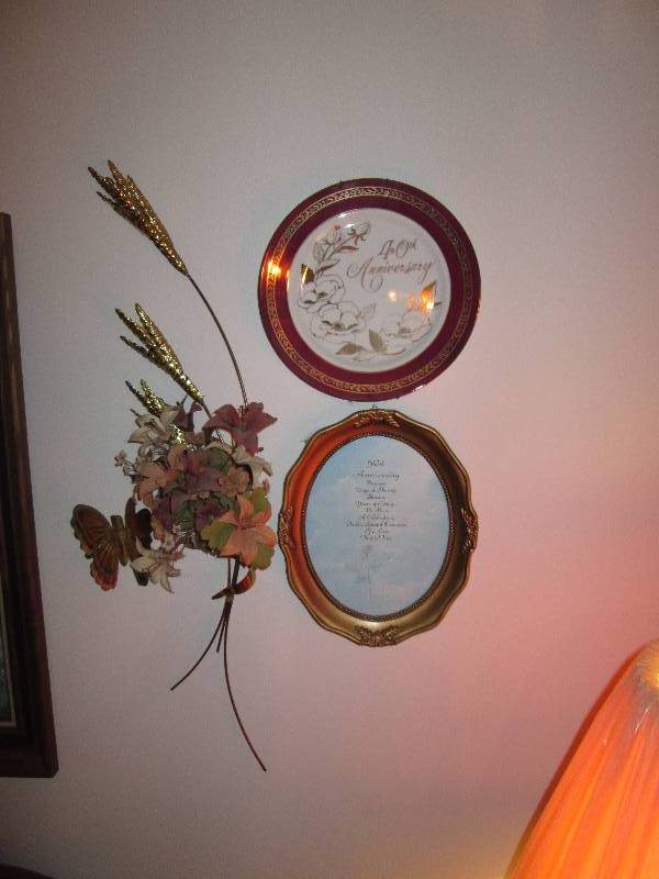lot 214 image: 40th and 50th wall display...