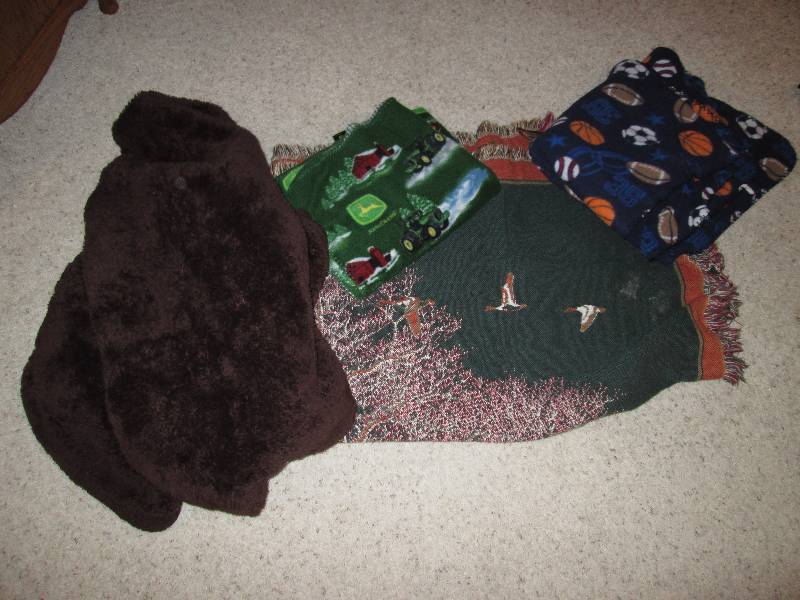 lot 218 image: John Deere and other blankets...