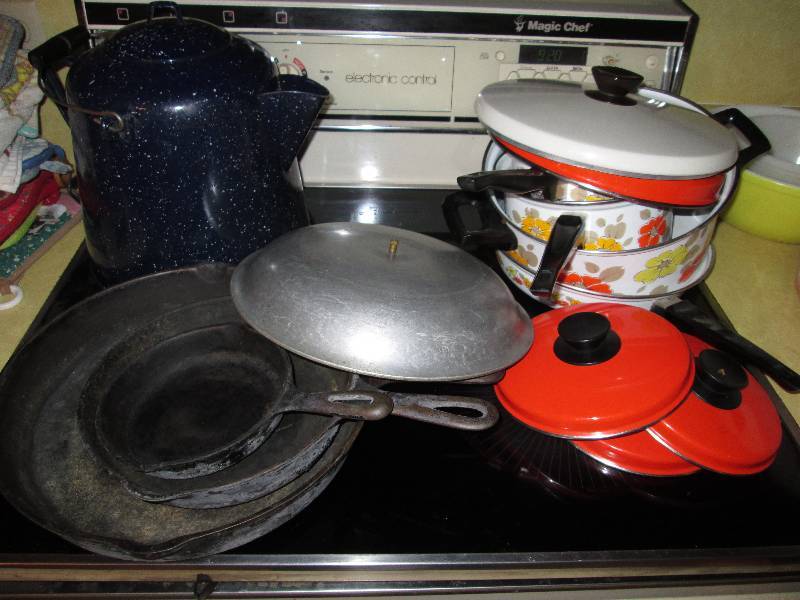 lot 305 image: Enamal ware, cast iron skillets, po...