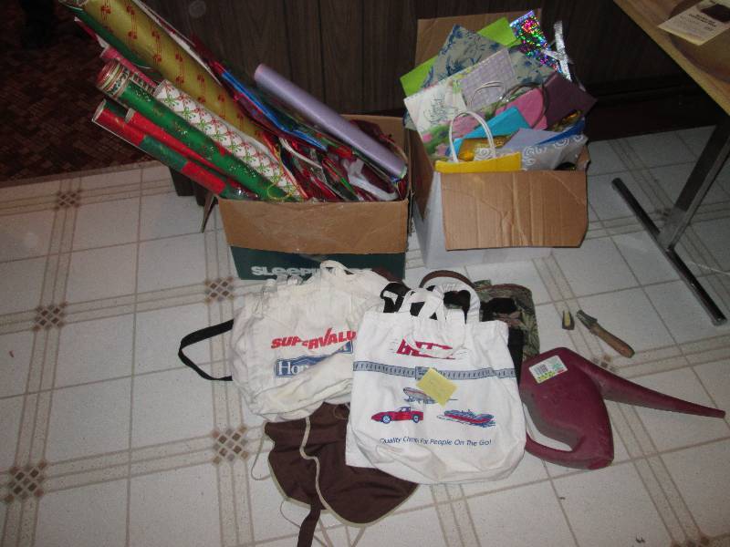 lot 323 image: Wrapping paper and gift bags with a...