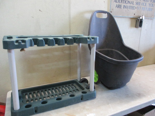 lot 37 image: Garage Organizer and wheel barrow