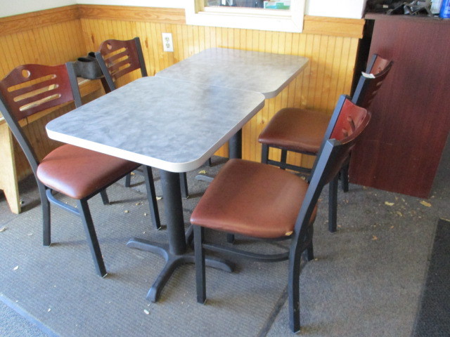 lot 6 image: (2) Bistro Style 2 Seat Restaurant Tables with (2) Chairs. Nice Shape used at food establishment over summer, strong chairs and tables.
