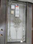 lot 40 image: Fibermate Gray Ash 80 X 36 Door with Antique Brass and Glass Window.