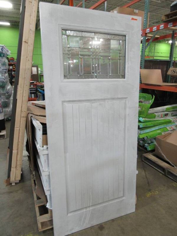 lot 45 image: Stanley Doors 36 in. X 80 in. 1 Lite 2-Panel Painted White Front Door.