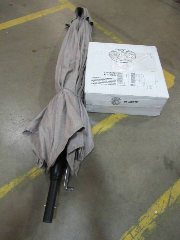 lot 149 image: Umbrella Base 230 Black (Sand or Water Fill) and Umbrella with crank and tilt. Missing Extension Pole.