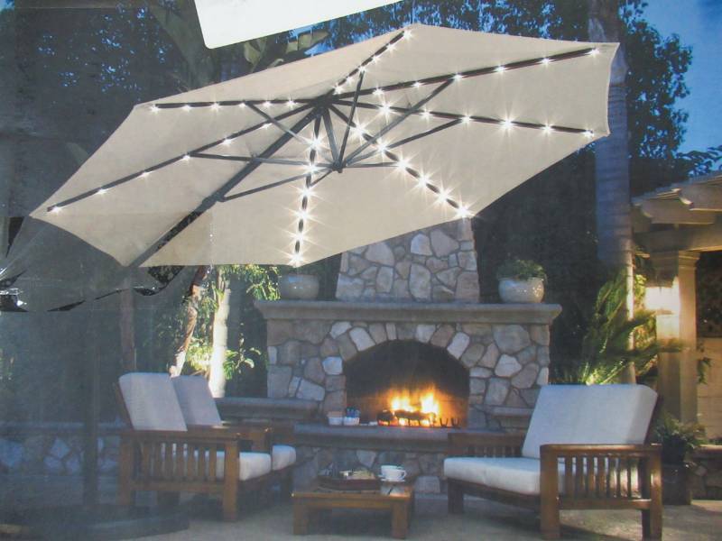 Simply Shade Cantilever Umbrella Tan Offset Pre Lit 11 Ft Patio Umbrella With Base Ag45rld Ls 4 Missing Charger 2 Small Holes In Canopy Mn Home Outlet Auction Burnsville 58 K Bid