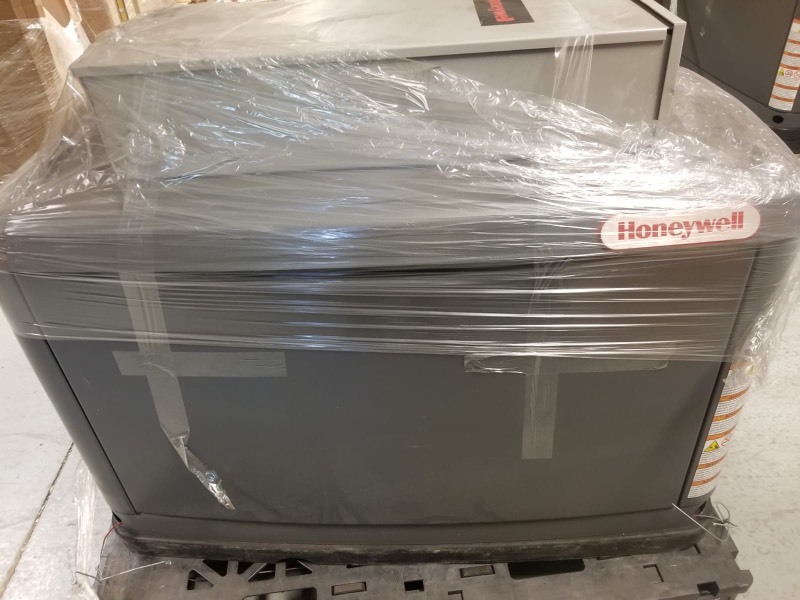 lot 38 image: Honeywell 17kw used Home Standby Generator w transfer switch not in working condition for parts or repair
