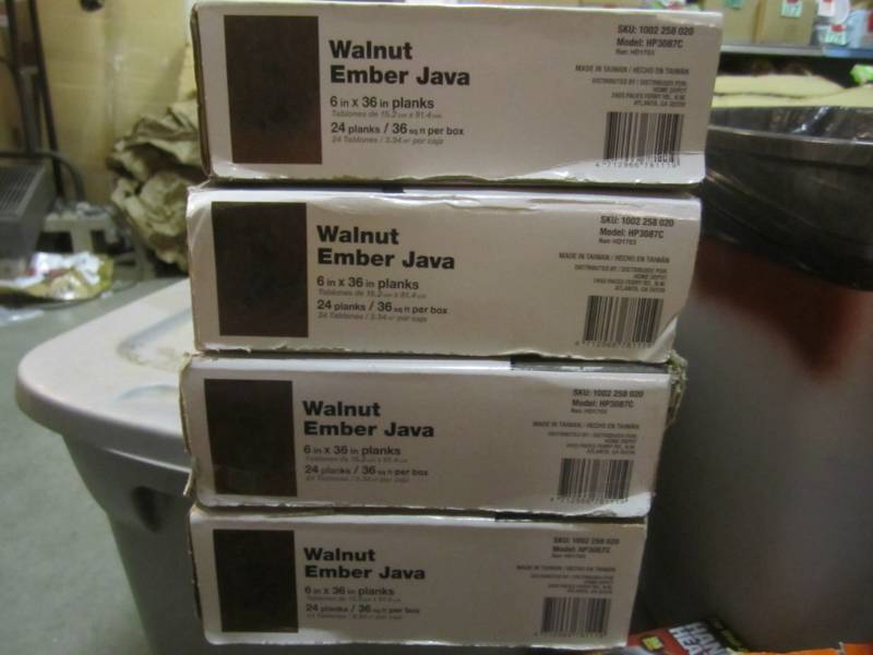 lot 4 image: 4 Cases of Traffic Master Walnut Em...