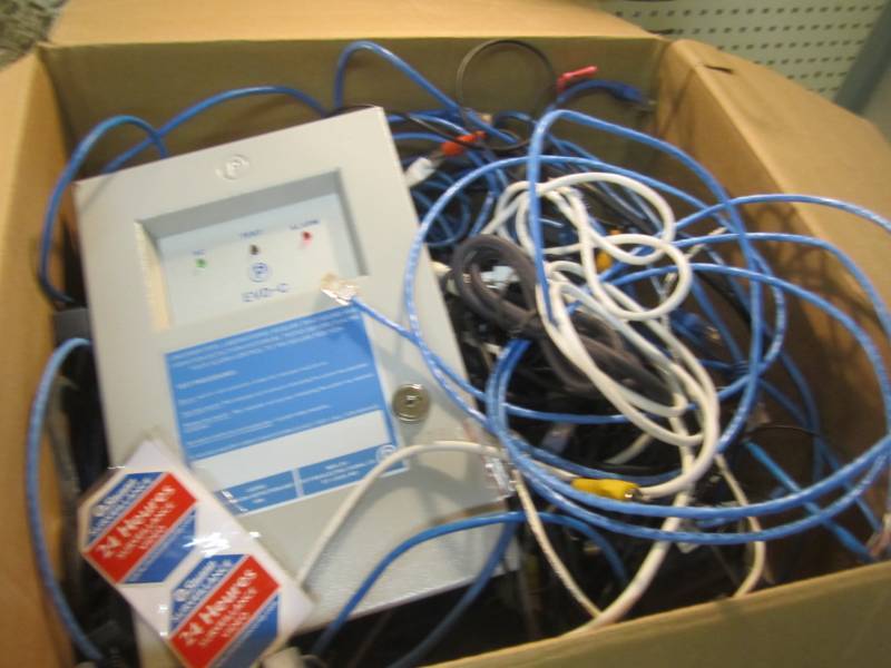 lot 55 image: Box full of what looks like a secur...