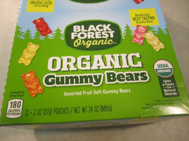 lot 130 image: Box of 12 Bags of Organic Gummy Bea...