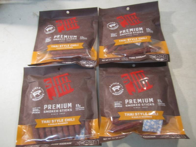 lot 150 image: 4 Bags of Slim Jim Premium Smoked S...