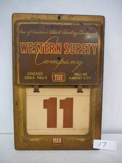 lot 17 image: Vintage Tin Calendar
