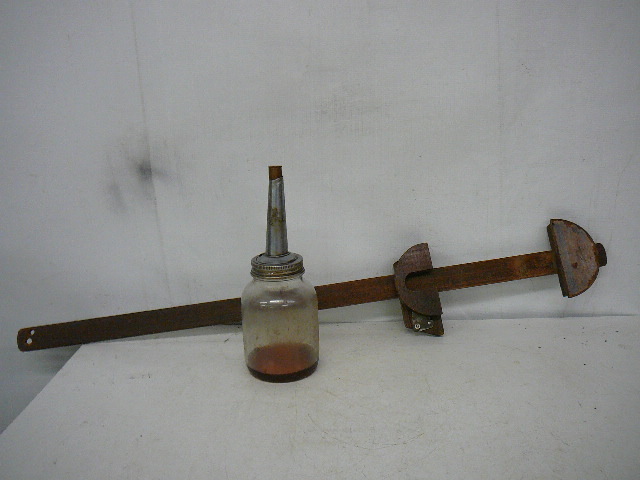 lot 23 image: Vintage Oil Dispenser & Belt Measuring Stick