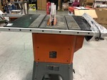 lot 101 image: RIDGID 13 Amp 10 in. Professional Cast Iron Table Saw in good condition