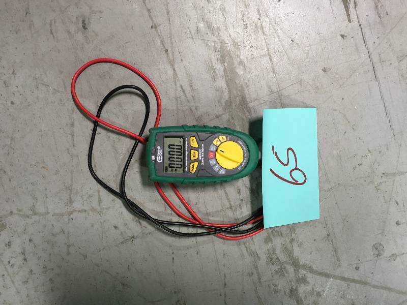lot 65 image: Commercial Electric Auto Ranging Digital Multi-Meter used works