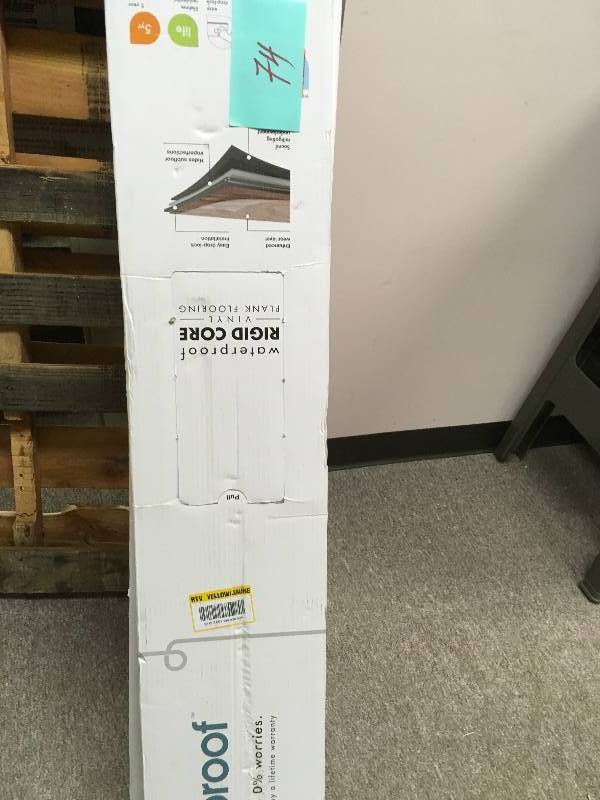 lot 74 image: LOT OF 5 CASES LifeProof Burnt Oak 8.7 in. x 47.6 in. Luxury Vinyl Plank Flooring (20.06 sq. ft.  case) not used