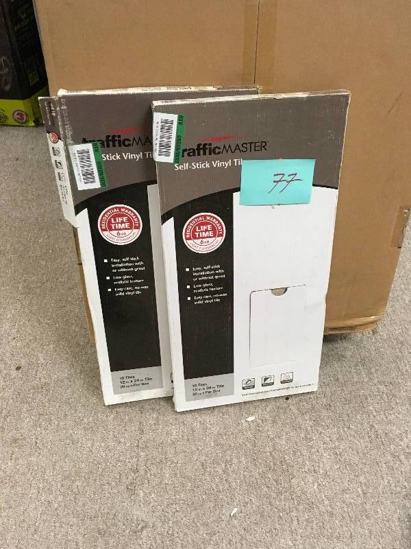 lot 77 image: TrafficMASTER Light Grey 12 in. x 24 in. Travertine Peel and Stick Vinyl Tile Flooring (20 sq. ft.  case)  LOT OF TWO CASES