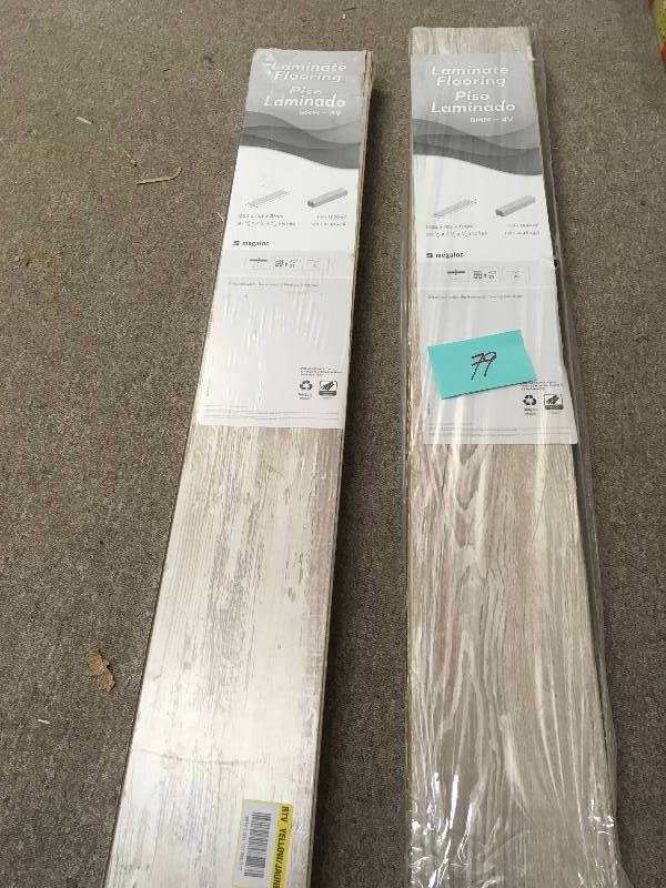 lot 79 image: Home Decorators Collection Denali Pine 8 mm Thick x 7-23 in. Wide x 50-58 in. Length Laminate Flooring (21.48 sq. ft.  case)  LOT OF 2 CASES not used