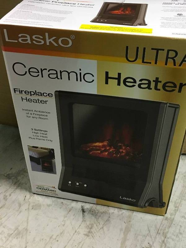 lot 23 image: Lasko 1500-Watt Ultra Ceramic Fireplace Portable Heater open box in good condition