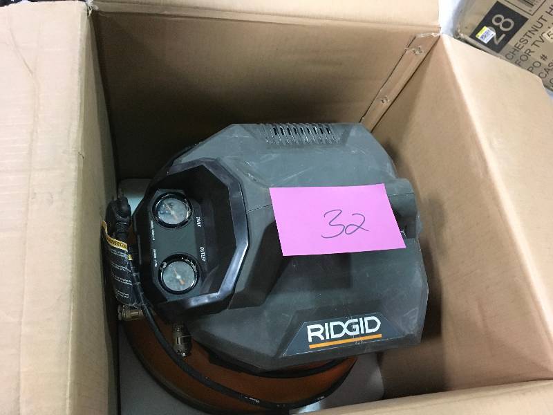lot 32 image: RIDGID Horizontal Large 6 Gal. Capasity Portable Electric Pancake Compressor In good condition.