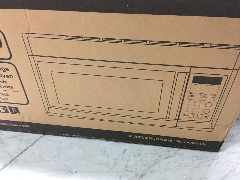 lot 34 image: Magic Chef 1.6 cu. ft. Over the Range Microwave in Black open box in good condition