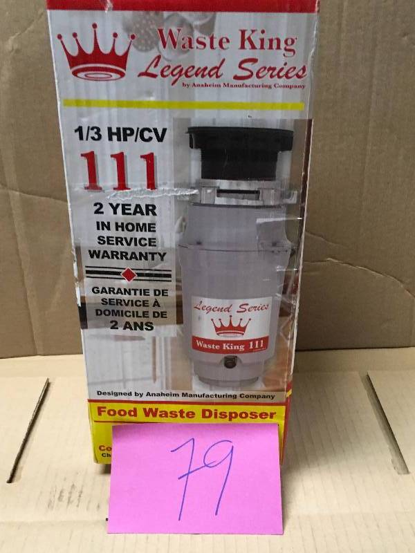 lot 79 image: Waste King Legend Series 13 HP Continuous Feed Garbage Disposal in good condition open box