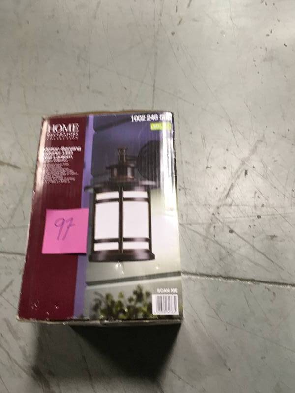 lot 97 image: Home Decorators Collection Oil-Rubbed Bronze Motion Sensor Outdoor Integrated LED Medium Wall Mount Lantern not used