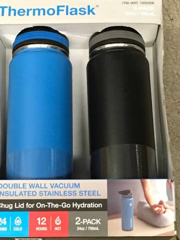 lot 95 image: ThermoFlask 2 Pack 40oz Double Wall Vacuum Insulated Light Blue & Black not used