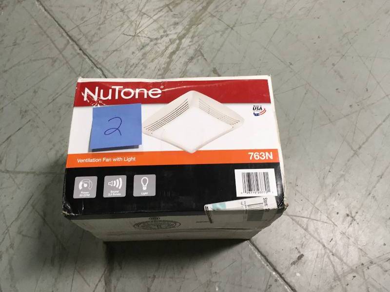 lot 2 image: NuTone 50 CFM Ceiling Bathroom Exhaust Fan with Light in good workimg condition