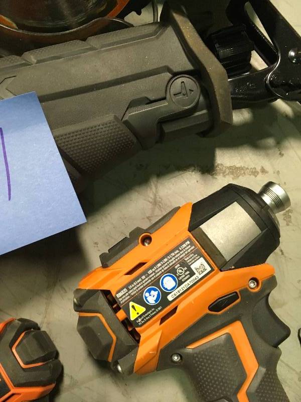 lot 21 image: Ridgid 5 tool Combo set includes 2 batteries and 1 charger used in working condition