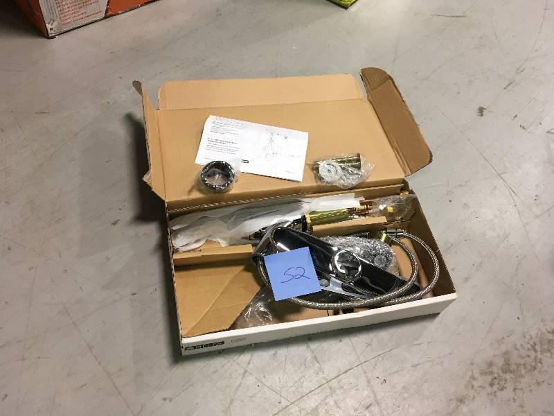 lot 52 image: Delta Foundations Single-Handle Pull-Out Sprayer Kitchen Faucet In Chrome not used