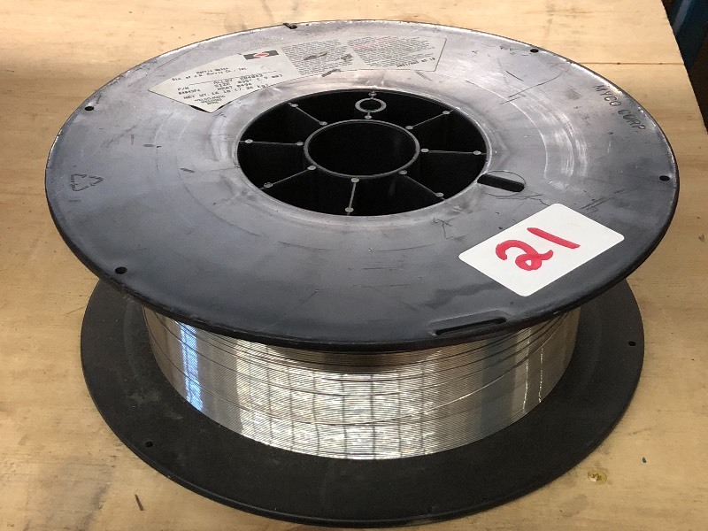 lot 21 image: Near-Full 16# Spool Of Harris Welco...