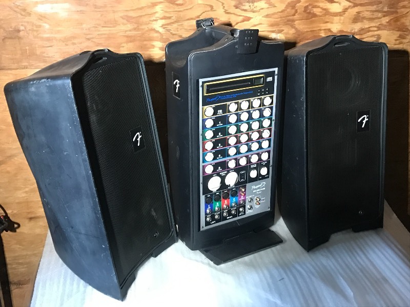 lot 26 image: Fender Passport Portable Stereo System  Karaoke System