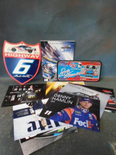 lot 13 image: Racing Sign, 2002 Daytona 500 Souvenir Program, CD and MORE