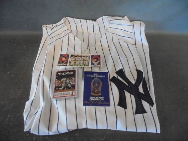 lot 62 image: Newunused Joe DiMaggio Yankees Jersey and More