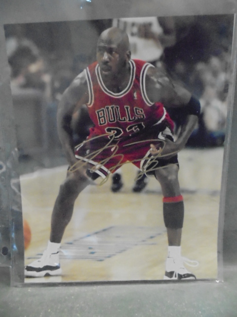 lot 127 image: Autographed Michael Jordan Photograph