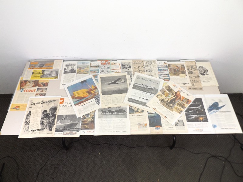 lot 15 image: Bagged and Boarded Vintage Magazine Planes and Trains Ads