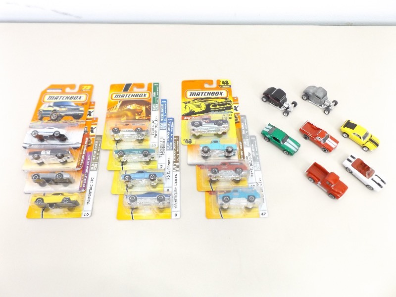 lot 38 image: 19 New in Package, and MINT Unplayed with Loose Matchbox Cars