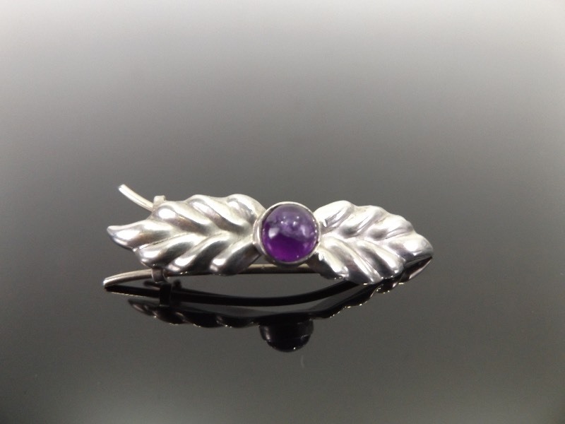 lot 58 image: .925 Sterling Silver Amethyst Wings Brooch