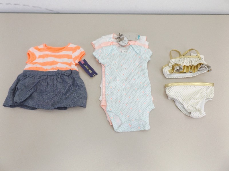 lot 73 image: Lot of New with Tags Baby Girl Outfits