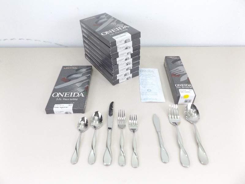 lot 87 image: NEW Oneida Satin Aquarius 48 Piece9 Serving Flatware Sets